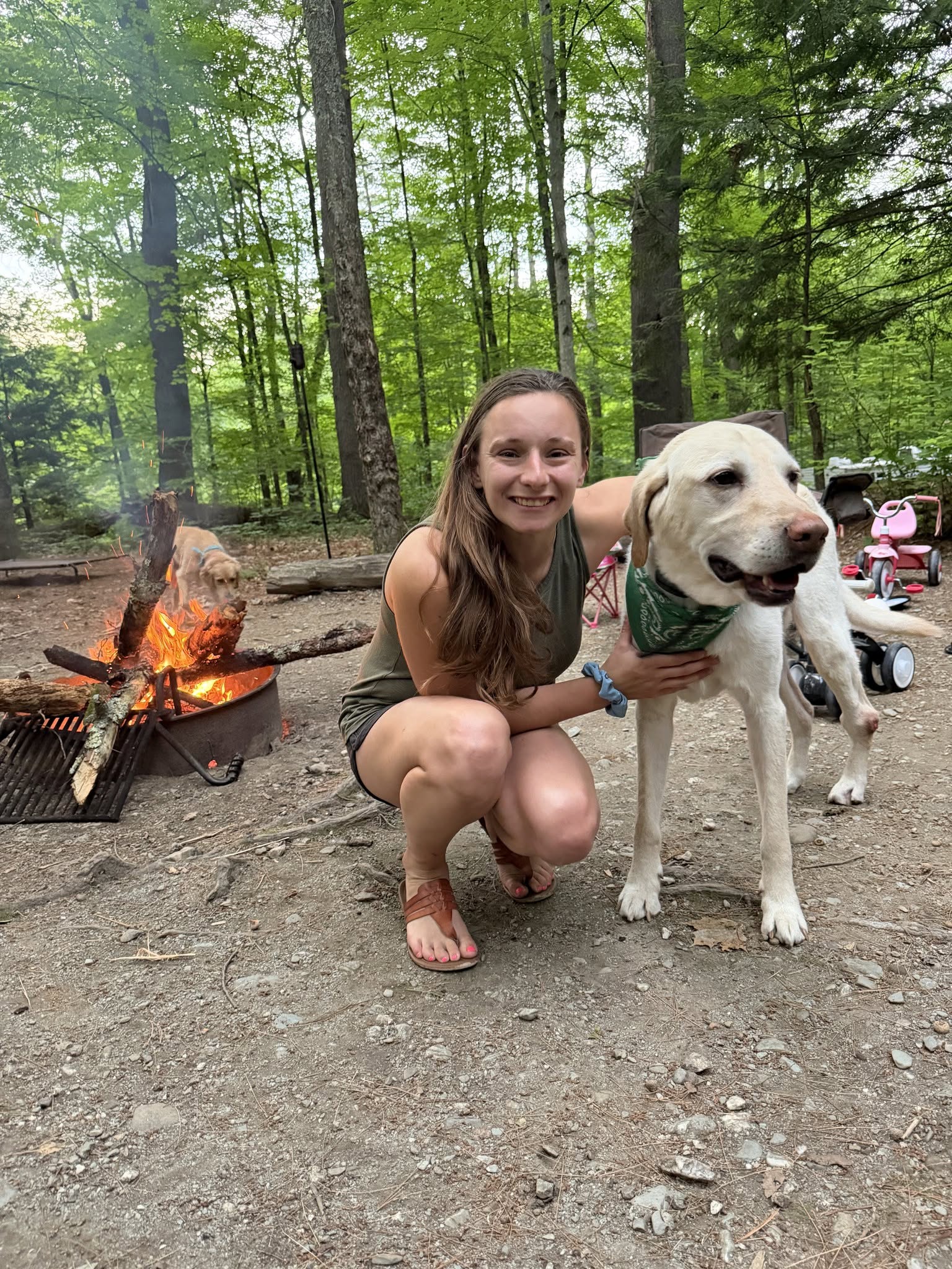 Christina Sullivan, owner of Muddy Hounds Grooming LLC, with a dog